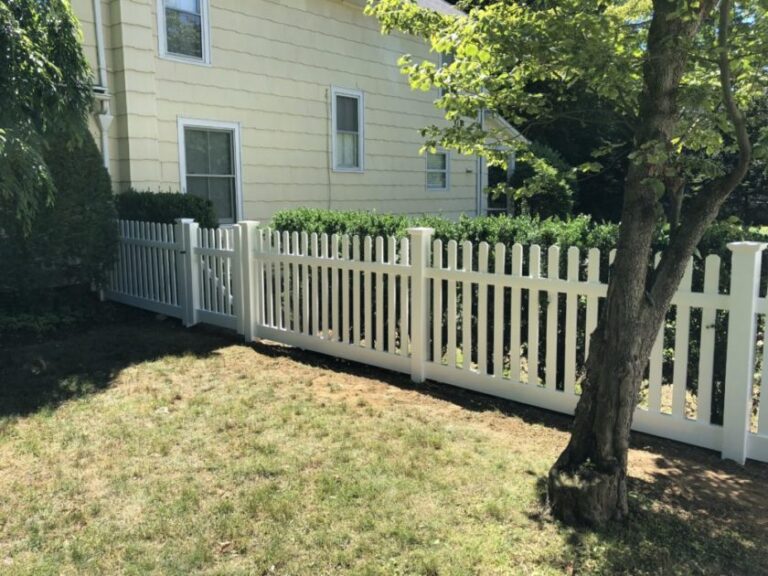White fence installation